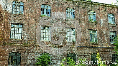 Panoramic broken Windows of an abandoned hospital Stock Photo