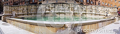 Panoramic and close view of Fonte Gaia in Piazza Del Campo in Siena Tuscany Stock Photo