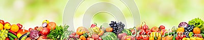 Panoramic collection fresh fruits and vegetables on green background. Stock Photo