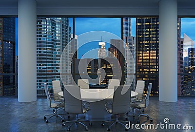 Panoramic conference room in modern office, cityscape of New York skyscrapers at night, Manhattan. Stock Photo