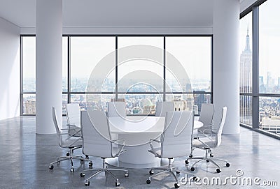 Panoramic conference room in modern office in New York City. White chairs and a white round table. Stock Photo