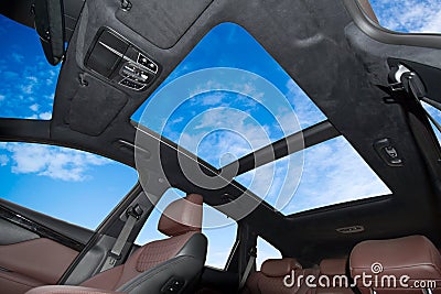 Panoramic double sunroof in a passenger car Stock Photo