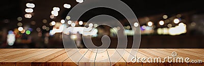 Panoramic empty clean wood counter table top on blur street night cafe background use for pub coffee shop montage dark scene, Stock Photo