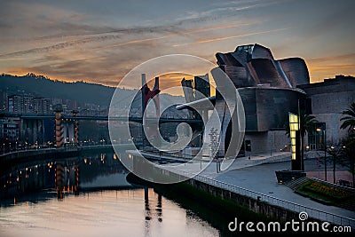 Panoramic exterior view of the Guggenheim museum in Bilbao at sunset Editorial Stock Photo