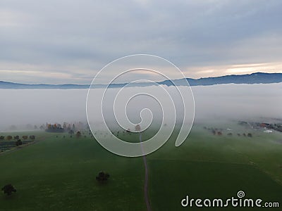 Panoramic foggy landscape with mountains in morning. Landscape Stock Photo