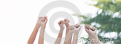 Panoramic group of hands business team raised fist air corporate celebration victory Stock Photo