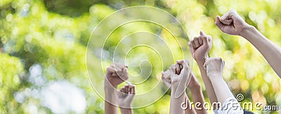 Panoramic group of hands business team raised fist air corporate celebration victory. Stock Photo