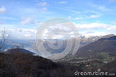 Panoramic image of Valcamonica with Lake Iseo and in the background the snow-capped mountains - Brescia - Italy 01 Stock Photo