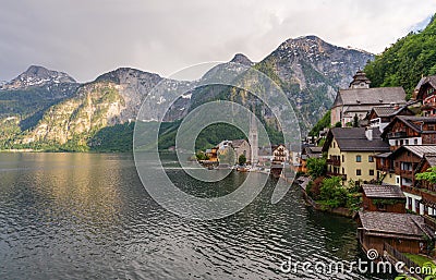 Panoramic lake with mountain and Hallstatt village in summer, famous landmark and travel destination in Austria Editorial Stock Photo