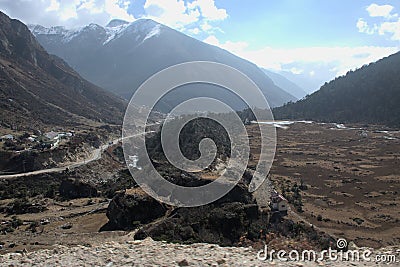 Panoramic landscape view of a dried river bed in the great himalayas mountains range on a hazy winter day in North Sikkim, Sikkim Stock Photo