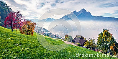 Panoramic morning view of outskirts of Stansstad town, Switzerland, Europe. Foggy autumn scene of Lucerne lake. Attractive lands Stock Photo