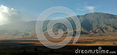 Panoramic mountain scenery with dryland foreground Stock Photo