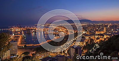 Panoramic night view of Malaga city, Spain Stock Photo