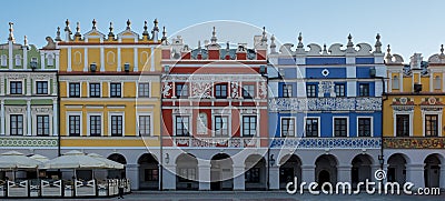 Panoramic photo of multicoloured renaissance buildings in the historic Great Market Square in Zamosc in southeast Poland. Editorial Stock Photo