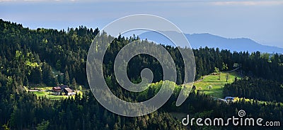 Panoramic picturesque landscape of a European secluded country house in a forest of Schwarzwald, Germany Stock Photo