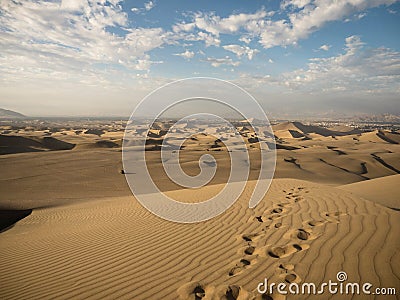 Panoramic postcard view of footprint desert dry sand dunes texture pattern oasis of Huacachina Ica Peru South America Stock Photo