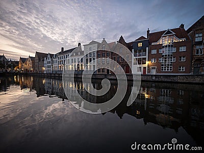 Panoramic reflection view of river canal channel in historic city center Bruges West Flanders Flemish Belgium Europe Stock Photo