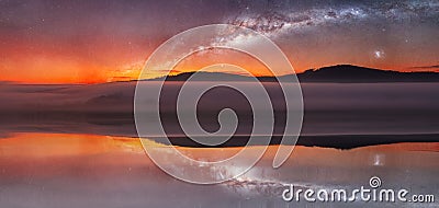 Panoramic reflection on water. Sunrise on distant hill with misty fog and milky way night sky. Czech landscape. Elements furnished Stock Photo