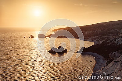 Panoramic sunset landscape of Petra tou Romiou (The rock of the Greek), Aphrodite& 39;s legendary birthplace in Paphos, Cyprus Stock Photo