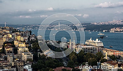 Panoramic sunset view on bridge and cruise ship in Istanbul augst summer Stock Photo