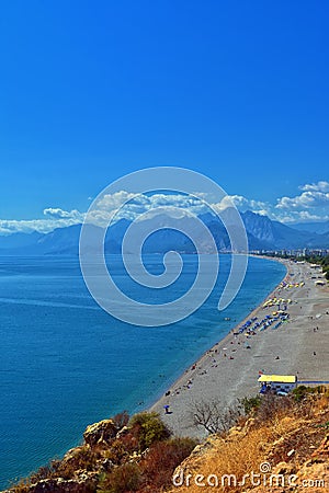 Panoramic view on Antalya beach, mountains and Mediterranean Sea from a ciff. Antalya, Turkey Stock Photo