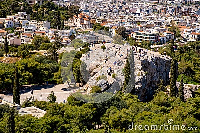 Panoramic view of Areopagus rock - Areios Pagos - seen from Acropolis hill with metropolitan Athens, Greece in background Editorial Stock Photo