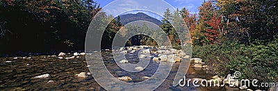 Panoramic view of an autumn waterway along the Kancamagus Highway in the White Mountain National Forest, New Hampshire Stock Photo