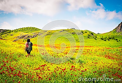 Panoramic view beautiful brunette woman enjoy spring wild nature landscape alone Stock Photo