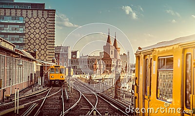 Berlin Oberbaum Bridge with trains at sunset, Berlin Friedrichshain-Kreuzberg, Germany Editorial Stock Photo