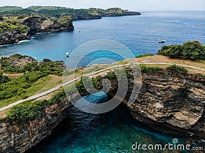 Panoramic view of broken beach in Nusa Penida, Bali, Indonesia. Blue Sky, Turquoise Water Drone photo Stock Photo
