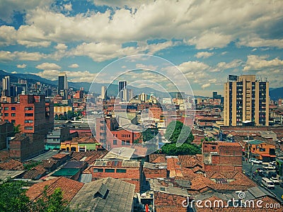 Panoramic of downtown Medellin with tall buildings, mud roofs and lots of color Stock Photo