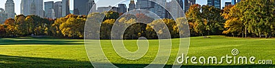 Panoramic view of Central Park Sheep Meadow in early morning sunlight. Manhattan, New York City Stock Photo