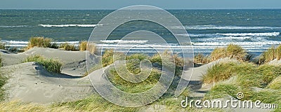 Panoramic view with dunes, beach and North Sea waves Stock Photo