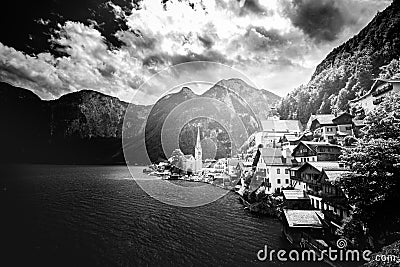 Hallstatt panorama. Clouds and Alps lake and mountain Stock Photo