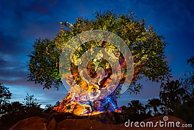 Panoramic view of Illuminated Tree of Life on blue night background at Animal Kingdom. Editorial Stock Photo