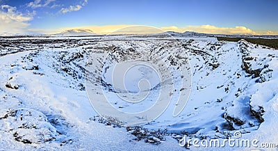 Panoramic view of the Kerid Volcano Iceland with snow and ice i Stock Photo