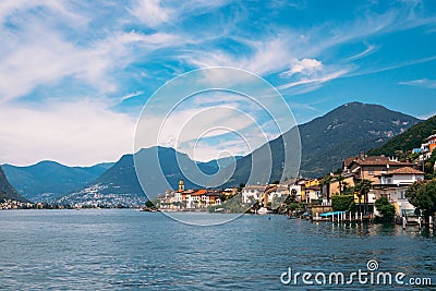 Panoramic view of traditional village of Brusino Arsizio on the shore of Lake Lugano, in Switzerland. Stock Photo