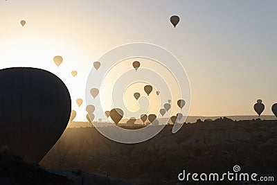 Panoramic view landscape with hot air balloons, sunrise on background Stock Photo