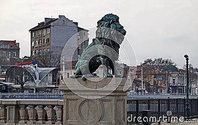 View of Lion`s Bridge from 1889 with lion sculptures, ancient buildings, intersection and traffic lights Editorial Stock Photo