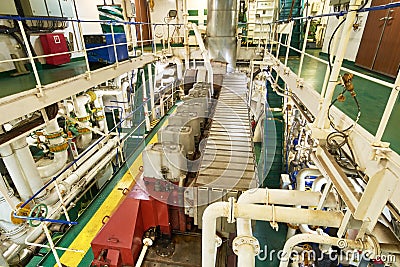 Panoramic view of main engine on a merchant ship in the engine room Stock Photo