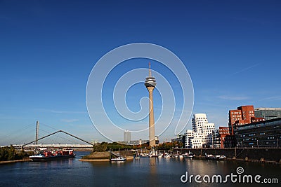 Panoramic View: Media Harbor with Rhine-Tower and famous buildings from Frank Gehry / Cityscapes of Dusseldorf / Germany Editorial Stock Photo