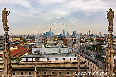 Blessing statues of Milan Cathedral above the city Italy Editorial Stock Photo