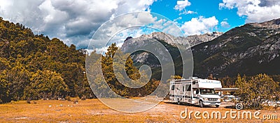 Panoramic view of MOTORHOME RV In Chilean landscape in Andes. Family trip traval vacation in mauntains Stock Photo