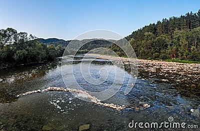 Panoramic view of mountain river stream wild landscape on scenic day in summer Stock Photo