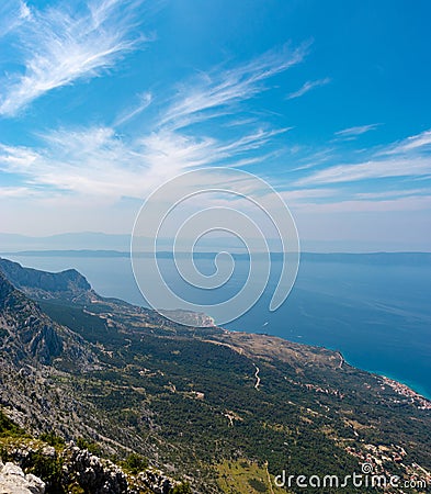 Panoramic view from the newly built Skywalk on Biokovo mountain in Croatia. View of the Adriatic sea, Tucepi and Podgora. High Stock Photo