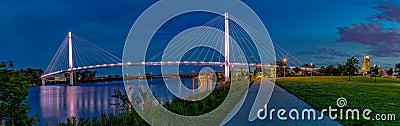 Panoramic view Night scene of Bob Kerrey pedestrian bridge Omaha Stock Photo