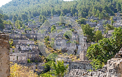 Panoramic view of old Greek house ruins in the ghost town of Kayakoy. Stock Photo