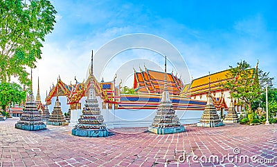 Panorama of Phra Ubosot surrounding wall with colorful chedis, Wat Pho complex in Bangkok, Thailand Stock Photo