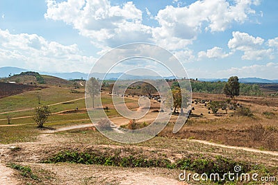 Panoramic view on Plain of Jars - unique archaeological landscape destroyed from cluster bombs. Phonsovan, Xieng Khouang Province Stock Photo