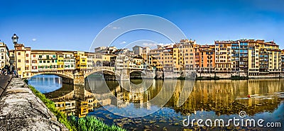 Panoramic view of Ponte Vecchio with river Arno at sunset, Florence, Italy Stock Photo